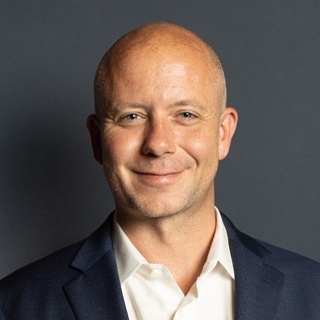 Chris Neeck, Chief Distribution Officer